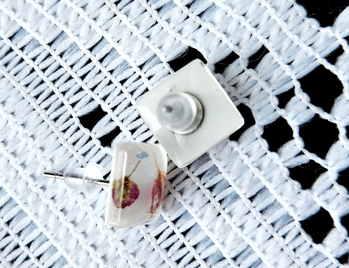 Small earrings, white with red seeds