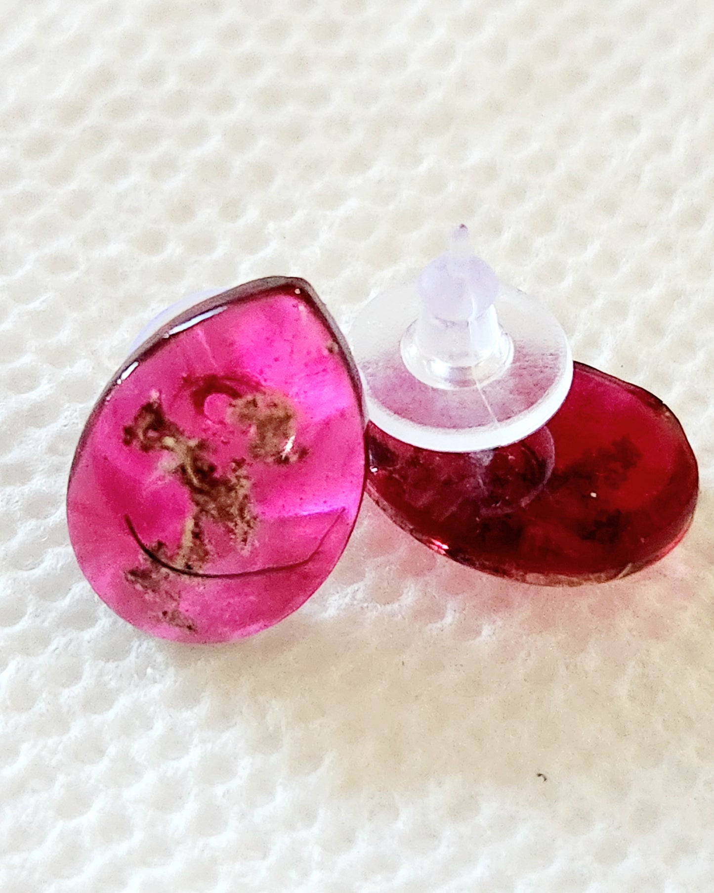 Small red earrings with real plants