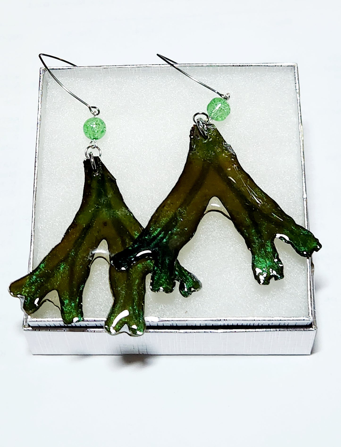 Seaweed earrings in green frond