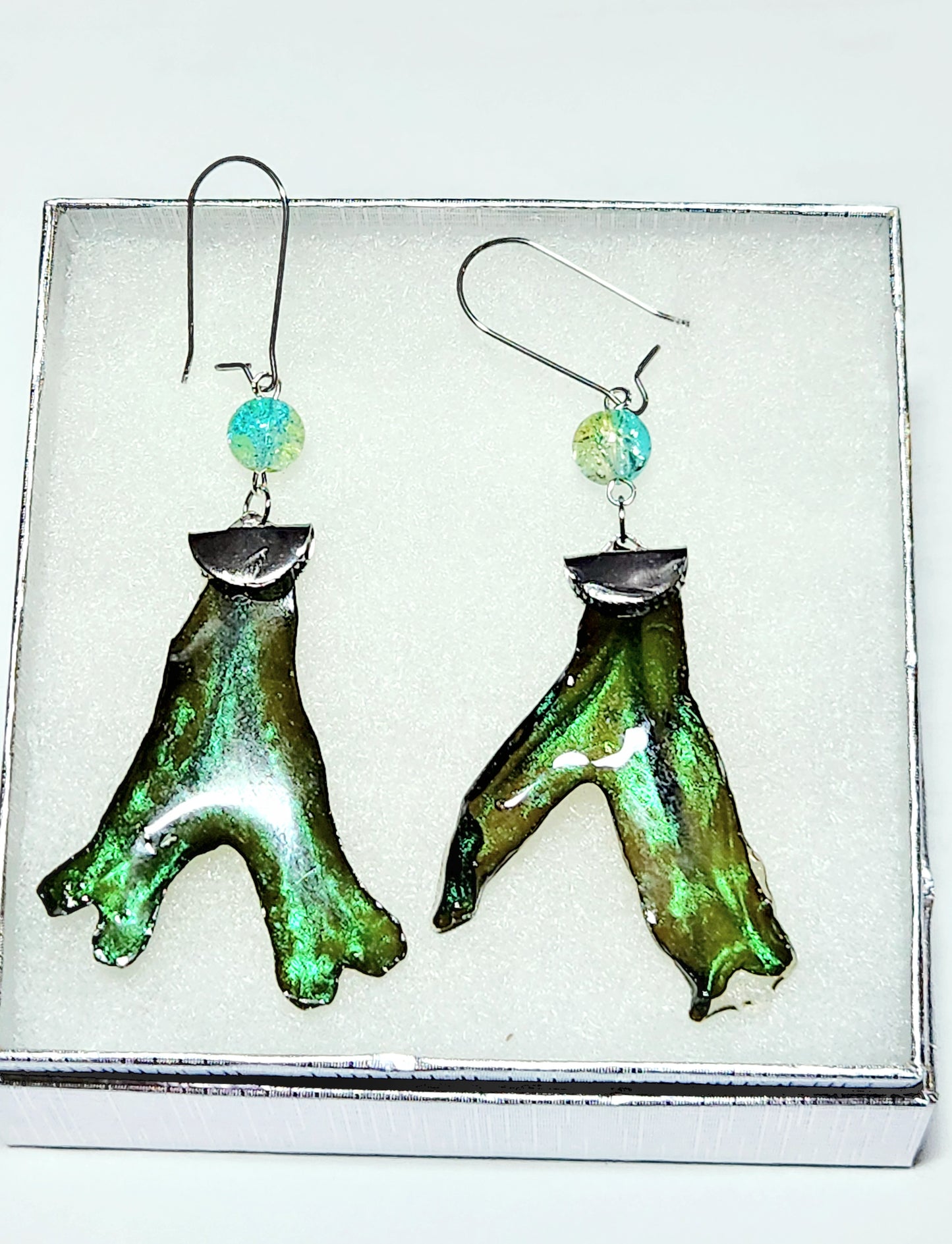 Seaweed earrings in green frond