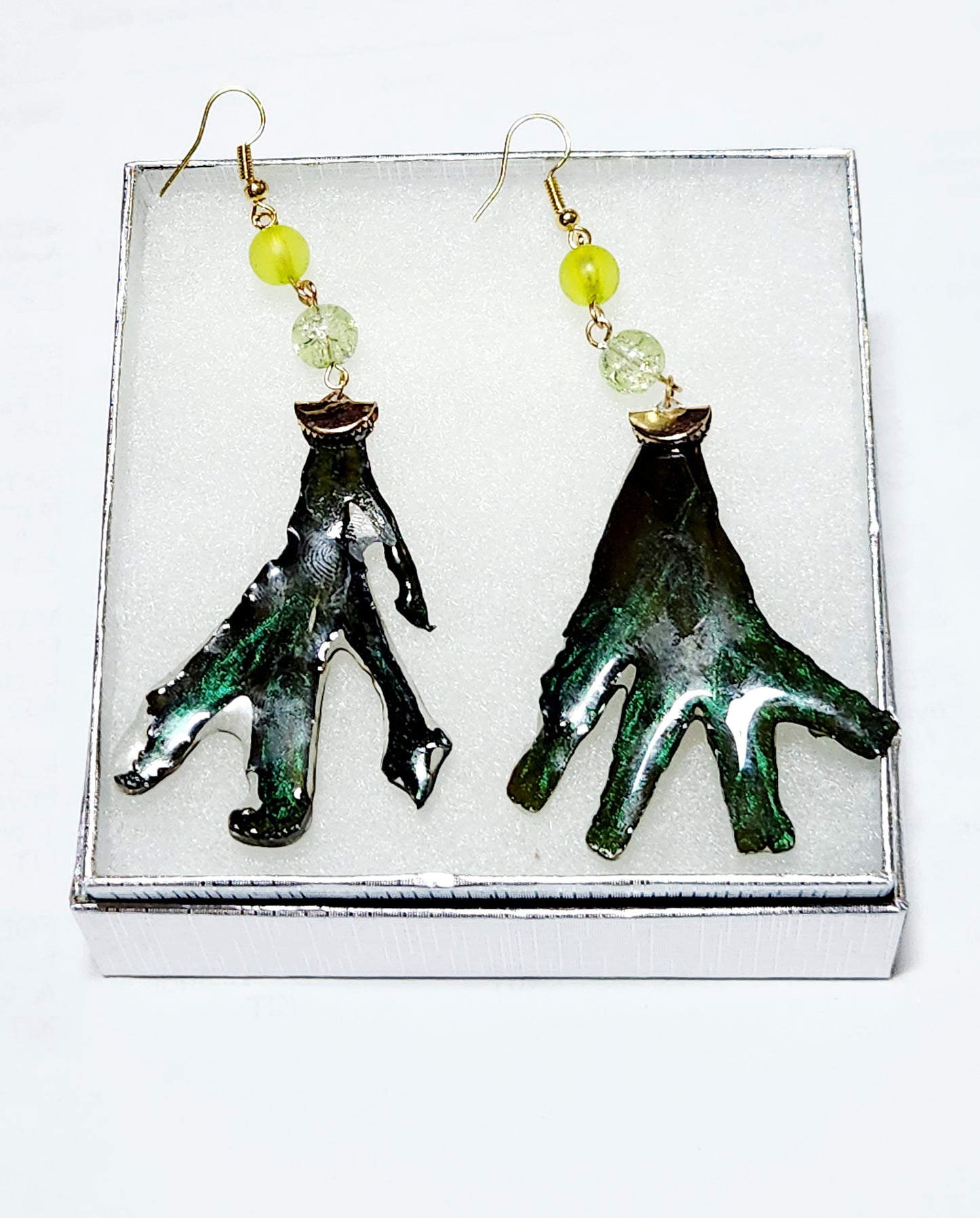 Seaweed earrings in green frond